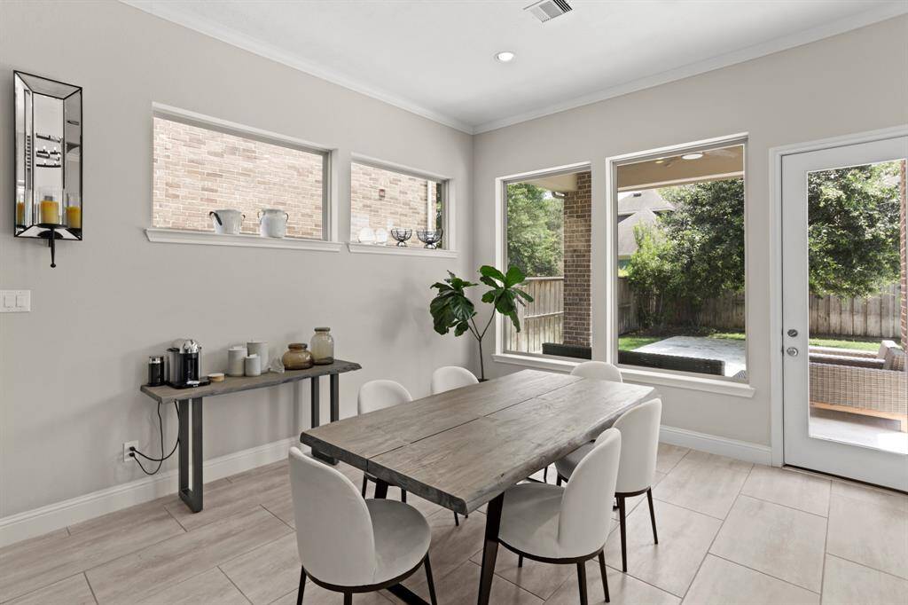 Breakfast area with view of the backyard.