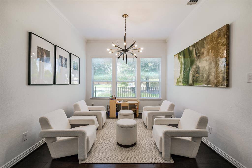 Formal Dining Room currently used as a Flex Space - note the beautiful light fixture.