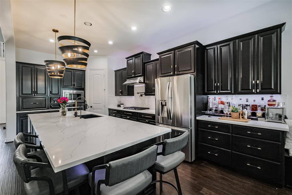 Butler's Pantry currently being used as a Bar--all cabinets are soft close and have under cabinet lighting as well as backlighting on top.