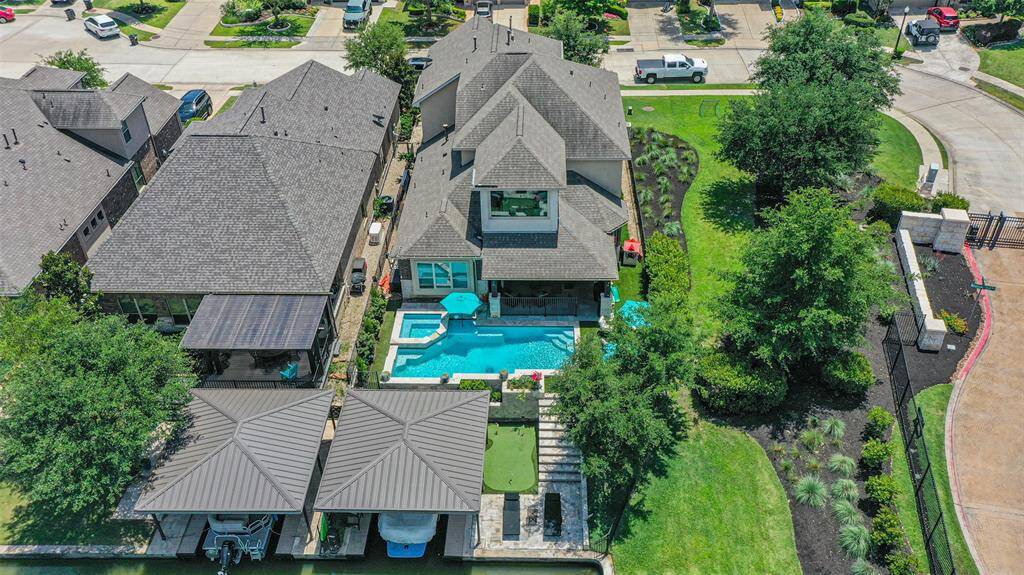 Welcome to 17922 Spoke Hollow, the lake house that has it all! Gated, no side neighbors, Pool/Spa, Boat house with hydraulic lift, putting green, covered Summer Kitchen and turf backyard for low maintenance! Available fully furnished if desired.
