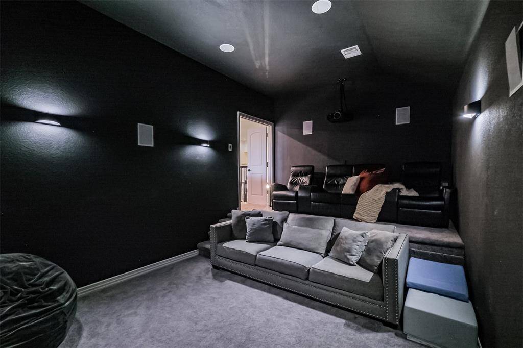 Tiered Media Room with custom paint and state of the art equipment.