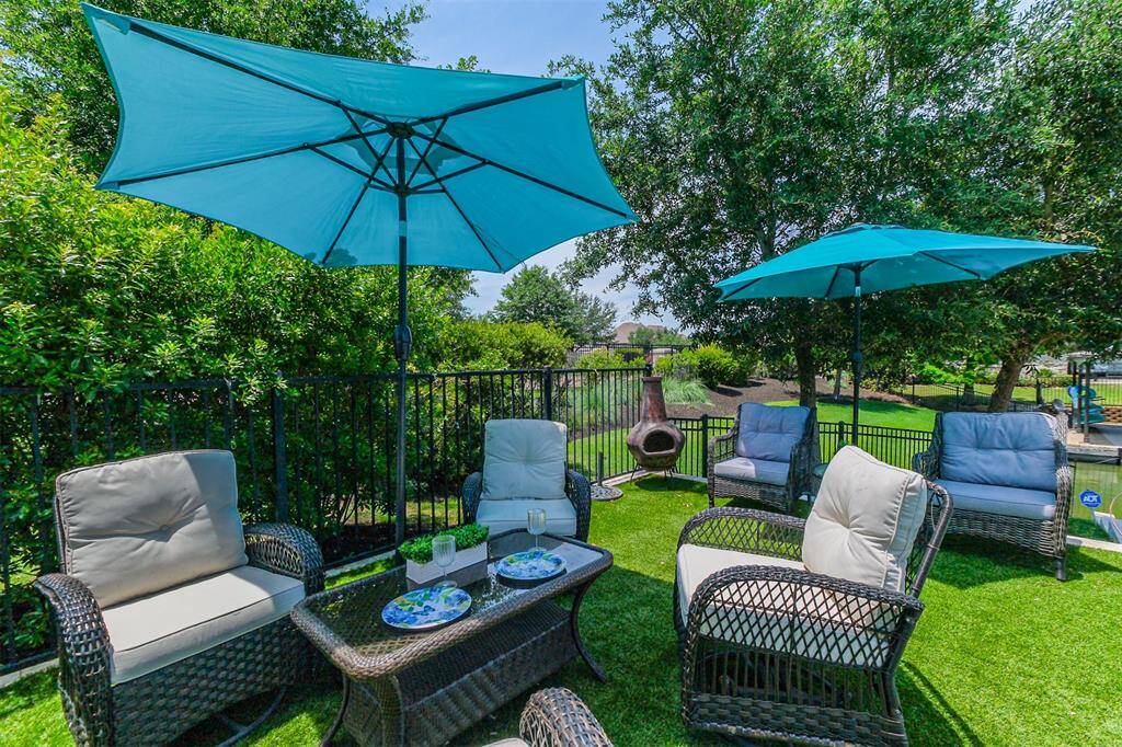 Picture yourself here after a long day of work--turf and mosquito misters make it even more enjoyable.