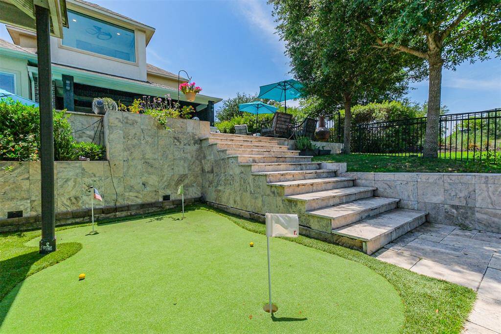 Golf?  Enjoy your own putting green by the lake!