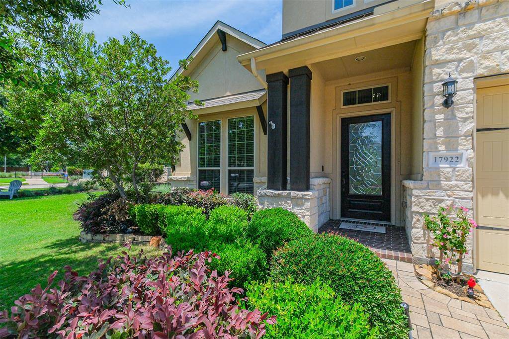Beautiful landscaping and green belt gives this property a unique location in Waterways