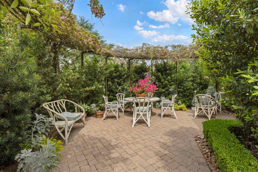 A secluded courtyard patio just off the owner’s retreat offers an intimate setting for morning coffee, evening wine, and heartfelt conversation.