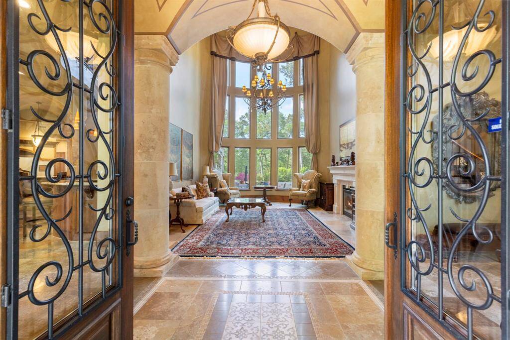 The formal entry sets the tone, gracefully welcoming guests into this exquisite home.