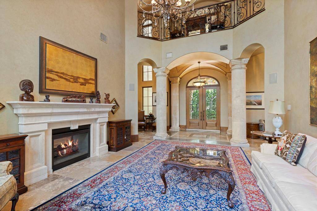 Formal Living showcases the refined finishes and architectural beauty that is carried throughout the home.