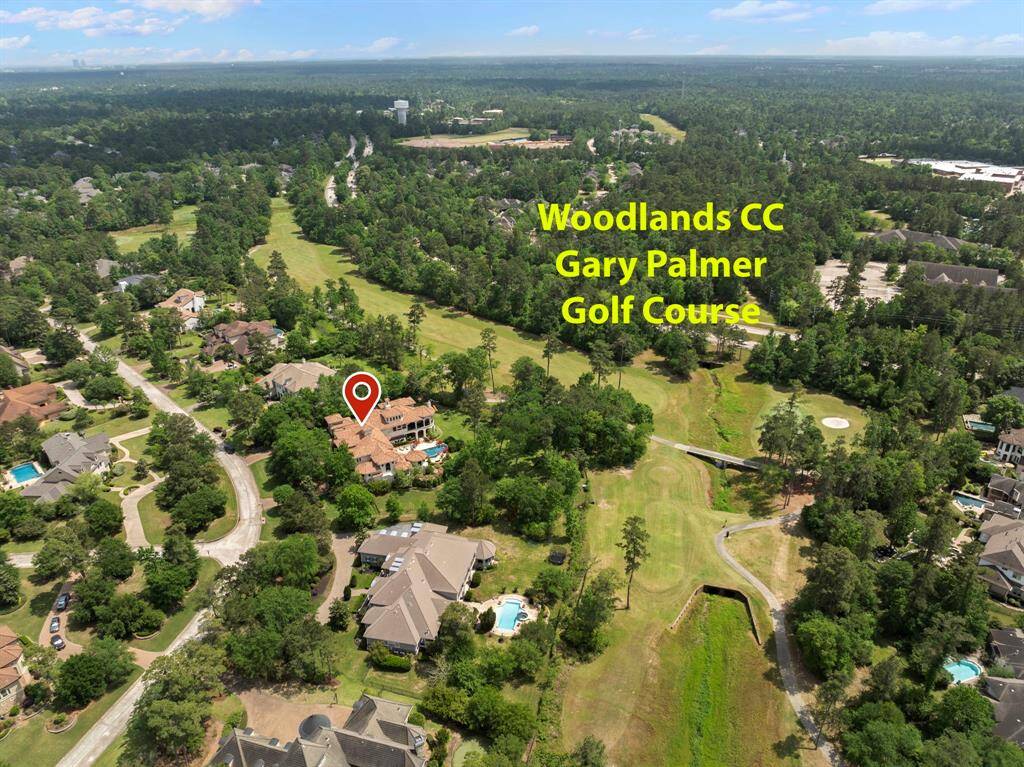 Gary Glen backs to The Woodlands Gary Palmer Golf Course in a quiet gated community.