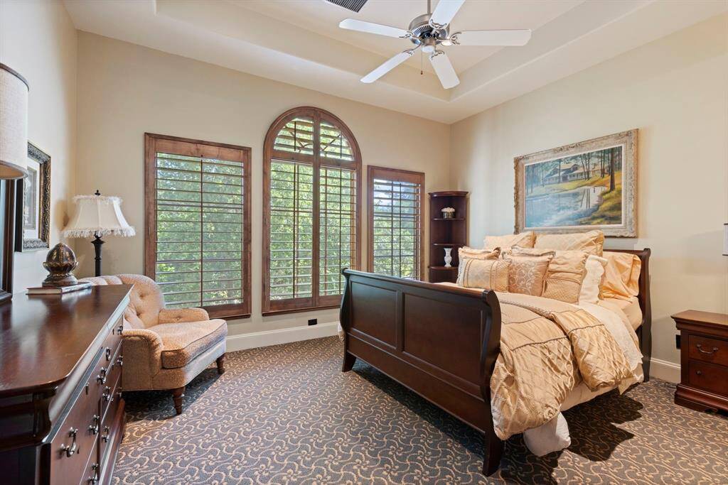 First of three additional oversized second floor bedrooms, all are ensuite and feature large walk-in closets.