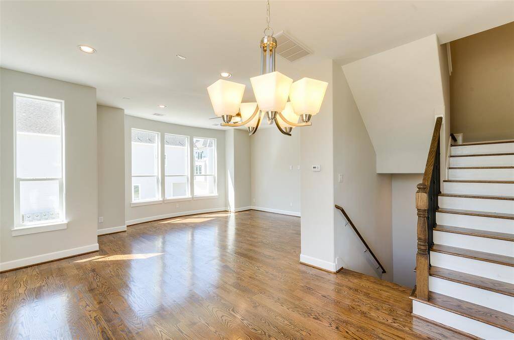 SPACIOUS 2ND FLOOR LIVING, FULL DINING ROOM PLUS SPACIOUS KITCHEN WITH BREAKAST ROOM NOOK, NOTICE THE PREMIUM HARDWOOD FLOORS AND ABUNDANCE OF WINDOWNS