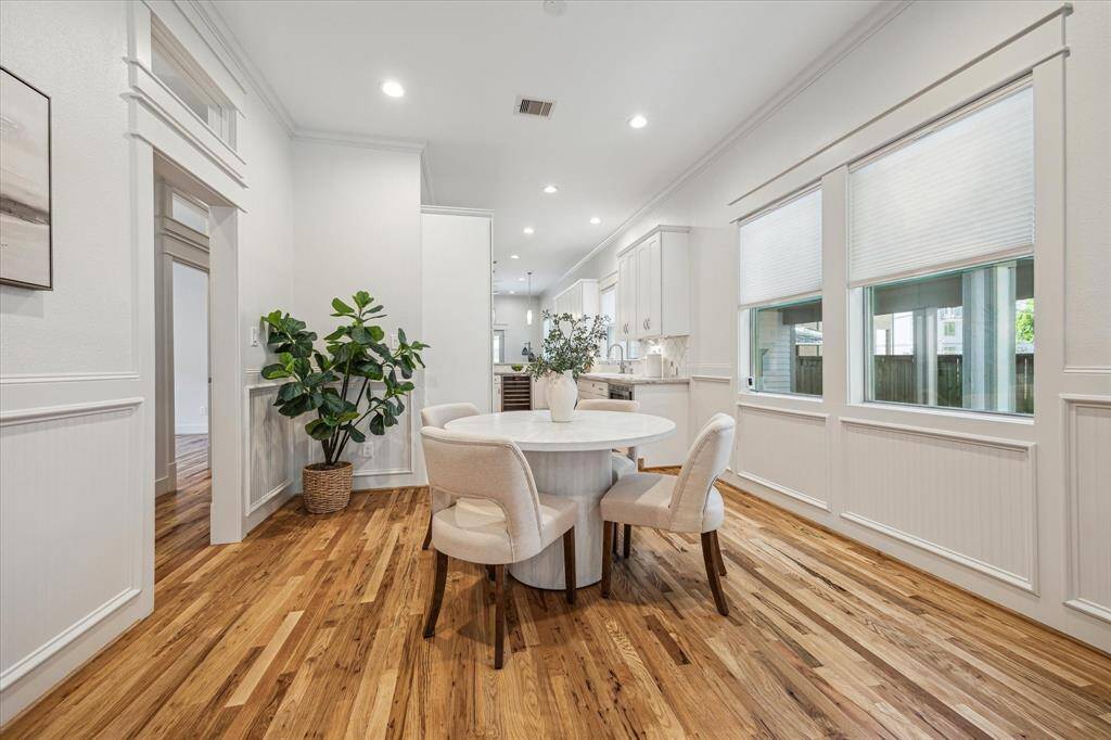 The dining room is in the center of the home