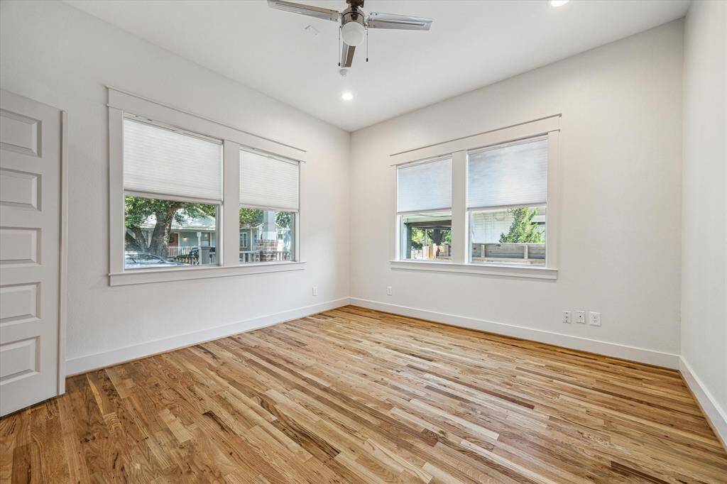 Hardwood floors, large windows, high ceilings in all the bedrooms create a bright and airy atmosphere!