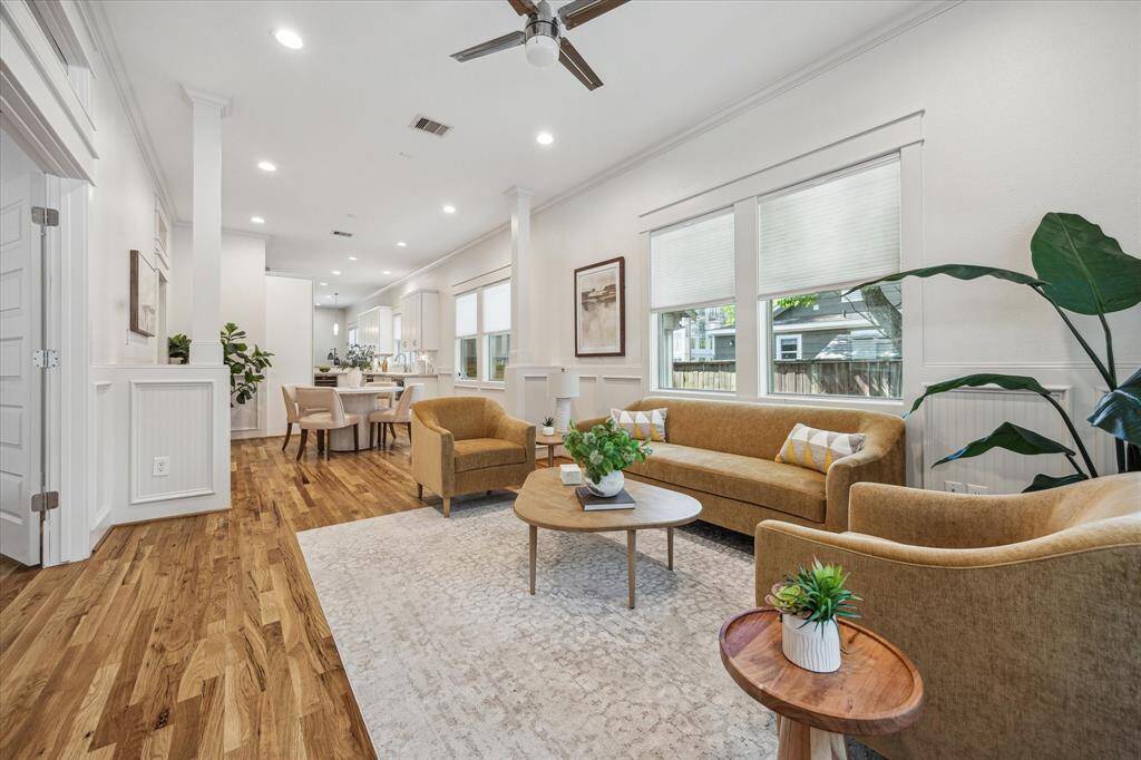 Seamless flow from the living room to the dining area and kitchen makes this space ideal for everyday living and effortless entertaining