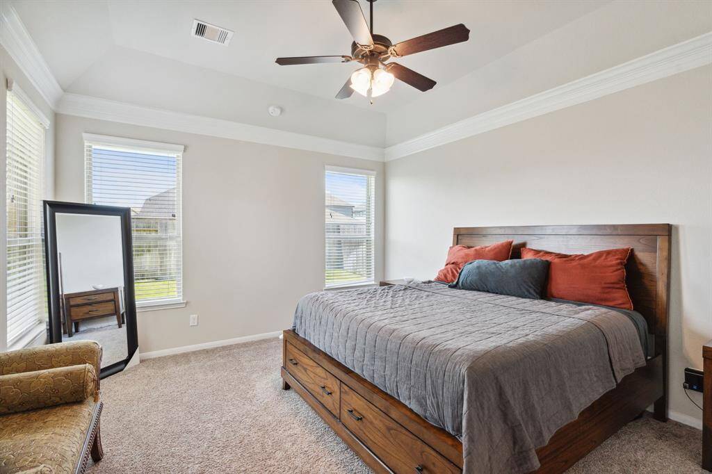 Step into the sanctuary of theprimary bedroom.