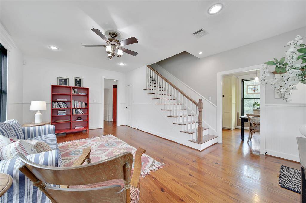 Another view of the secondary family room and stairs leading to 2 more bedrooms