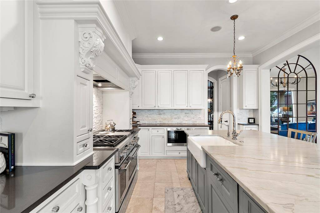 Pass through the butler pantry on the way to the dining room at the front of the house