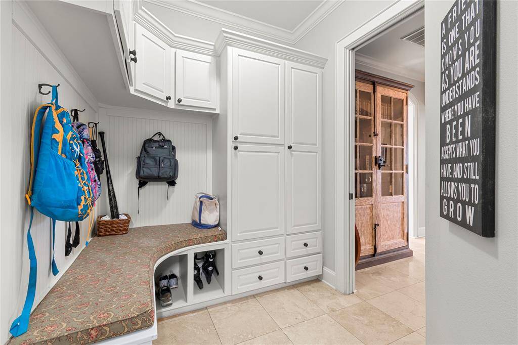 Backpack drop/mud room and extra built in storage.