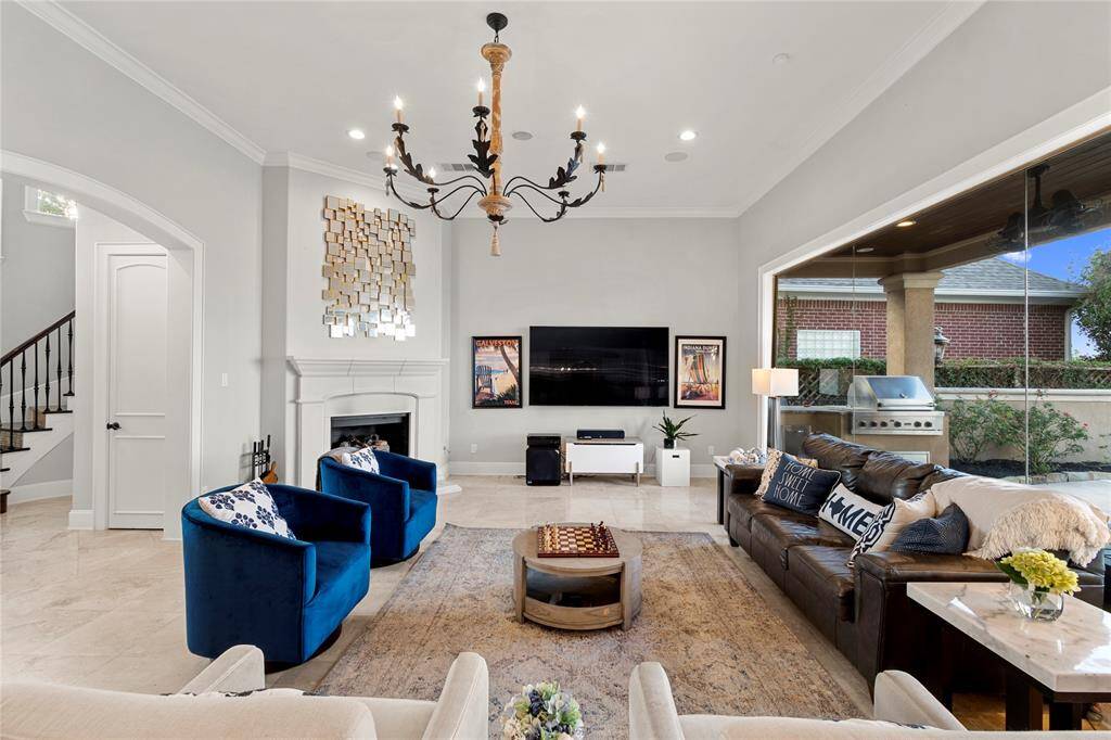 Another view of the Family Room, and a sneak peak at the outdoor kitchen.
