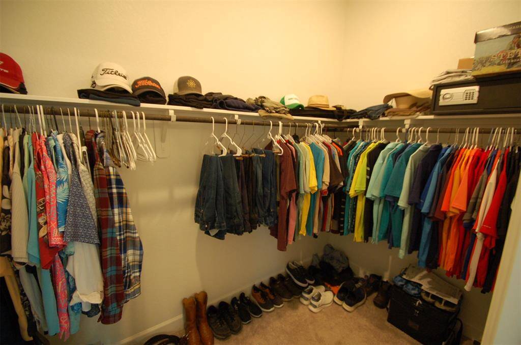 Primary walk in closet for her