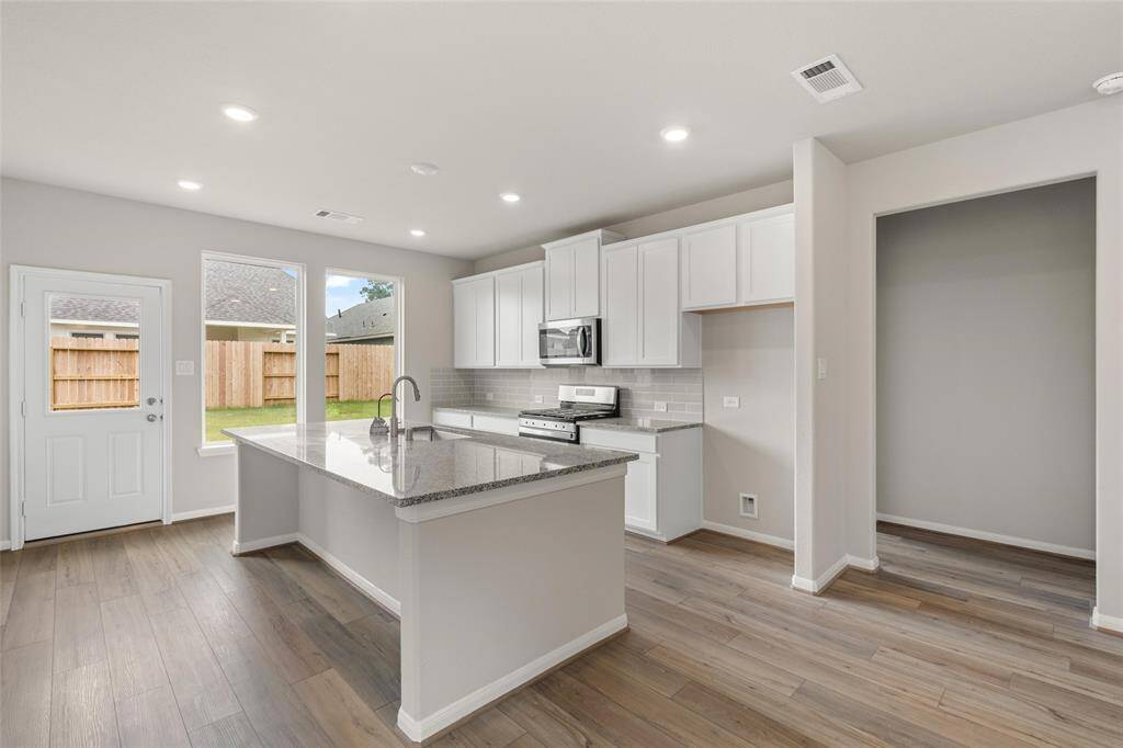 Note: Sample product photo. Actual exterior and interior selections may vary by homesite. Photo may be virtually staged