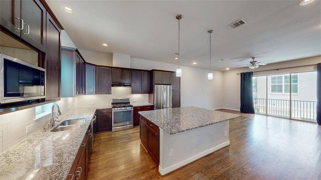 Large eating area with an abundance of natural light.