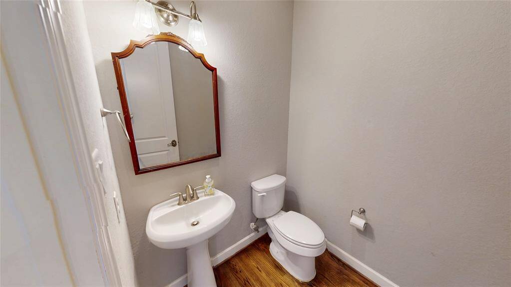 This half-bathroom is located off the main living area on the 2nd floor.