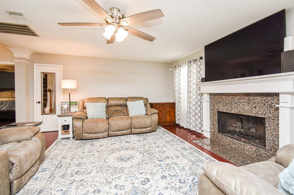 Imagine this warm space at holiday time, filled with family and friends gathered around a glowing gas log fire!