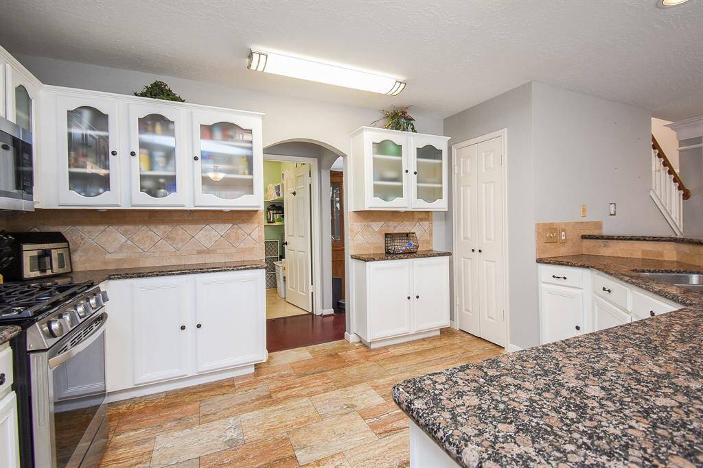 Display style cabinetry is easy on the eyes when tasking and to be admired, when dinner is done!