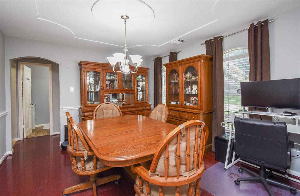 Bright natural light warms this special dining area, with access to kitchen and rooms, up and off left.