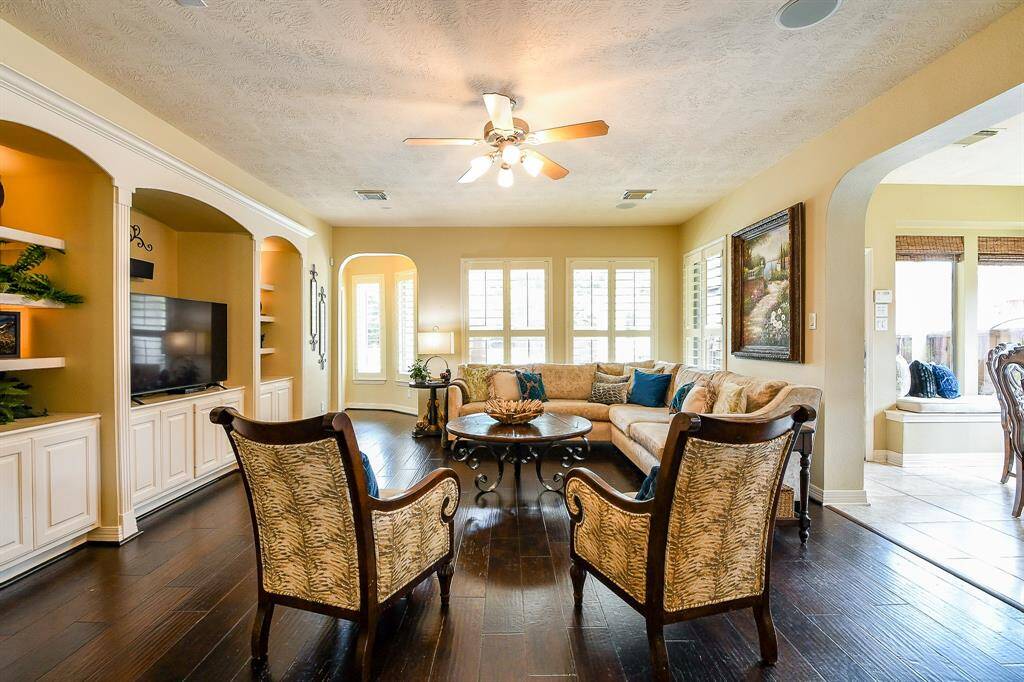 The family room is a wonderful, cozy area overlooking the beautiful backyard.