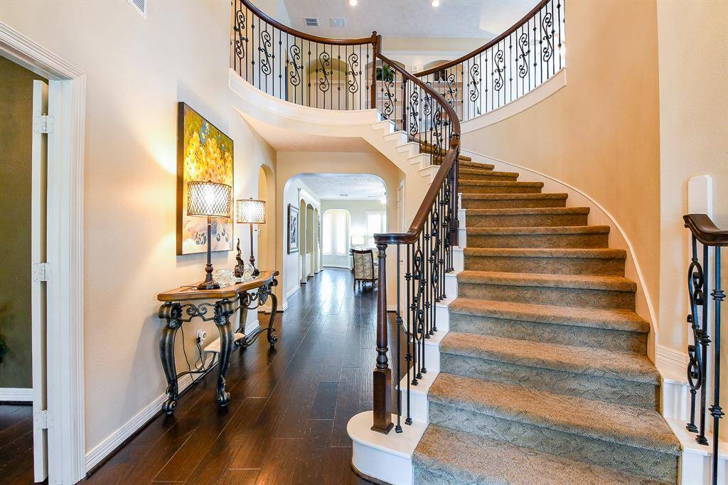 Step inside the front door and you are flanked by the formal living to the left, and formal dining to the right. The family room is straight ahead. You will impressed by the elegant staircase, soaring ceilings, and beautiful millwork.