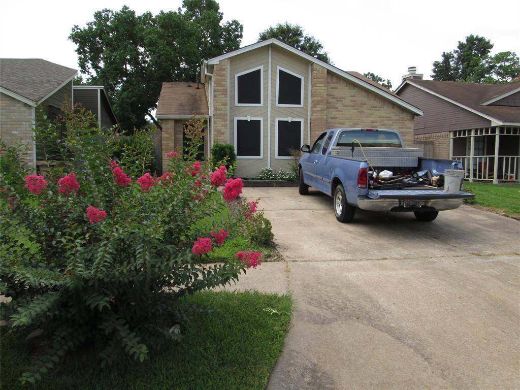 Double wide driveway can handle 4 cars .