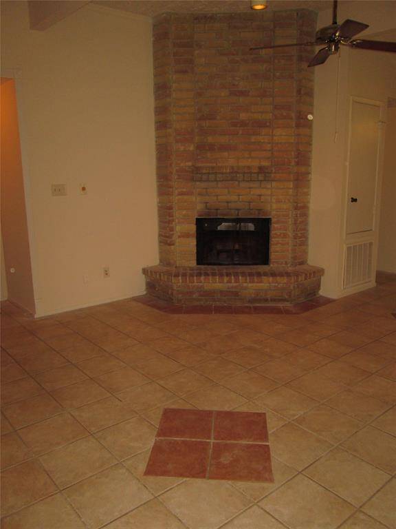 New tile just installed ! House has no carpet now! Pretty porcelain Italian tile now in both bedrooms and closets.