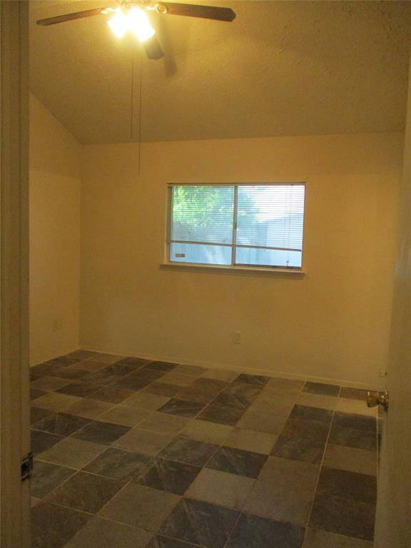 large shed in the back yard has extra shelving and solid base. It's lockable with a padlock too.