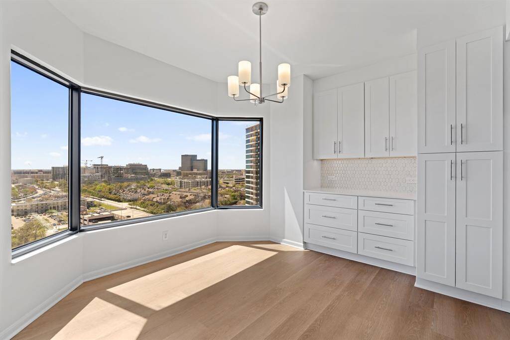 Dining area with extended cabinetry for additional storage.