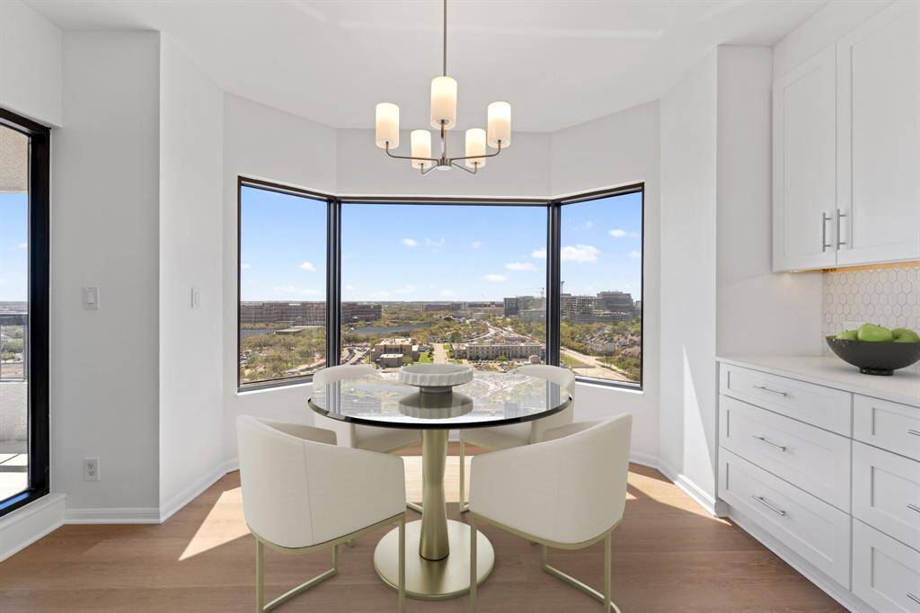 Dining area shown virtually staged.
