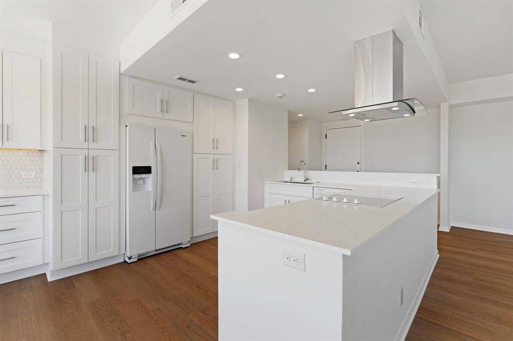 Kitchen with custom cabinetry, Quartz counters and all new appliances.