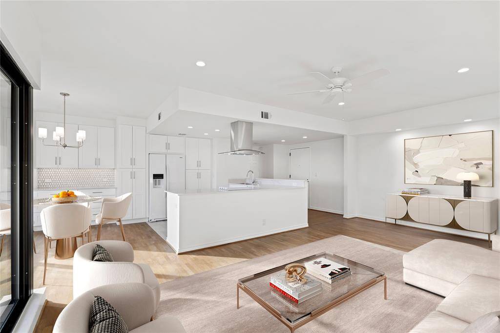 Recessed lighting on dimmers throughout. Great wall space for art and furniture placement. Image shown virtually staged.
