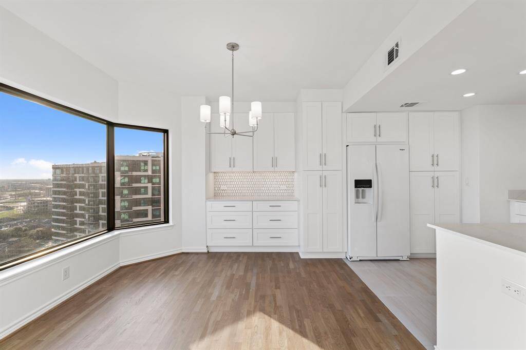 Custom cabinetry designed to maximize storage throughout.
