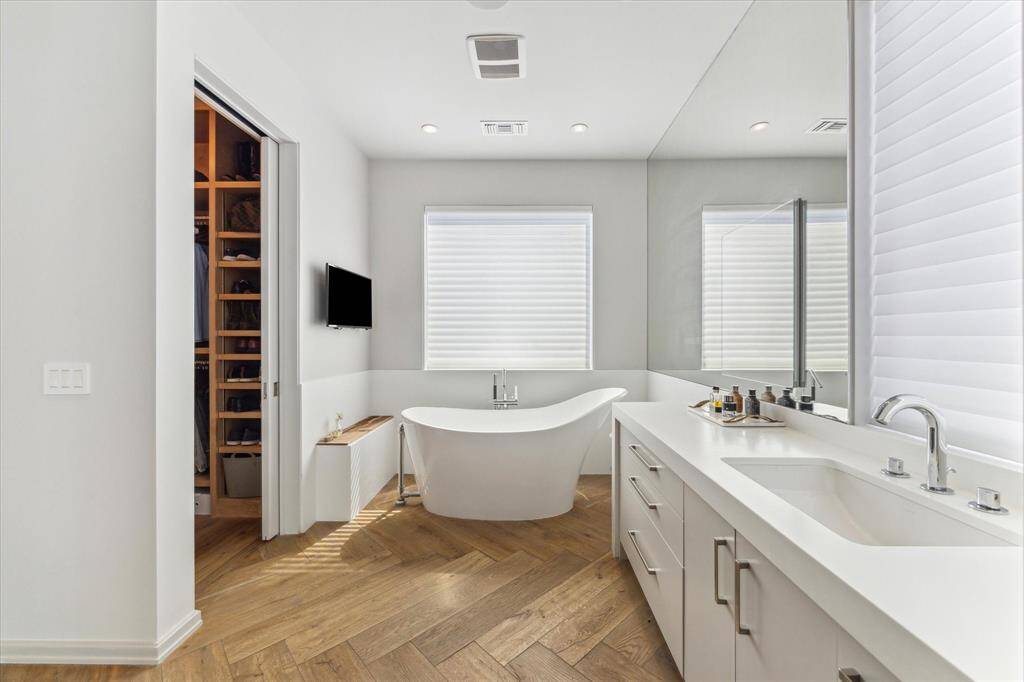 Serene primary bedroom designed for rest and relaxation. Soft natural light fills the space in the early hours, while the layout invites quiet mornings, slow evenings, and everything in between.
