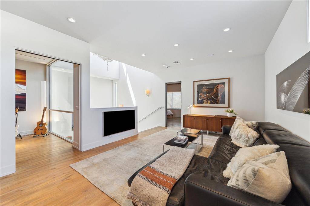 Moving to the next floor you can truly experience and enjoy the detail of this extra wide staircase illuminated by the natural light. All of a sudden a staircase becomes a focal point beyond just a function.