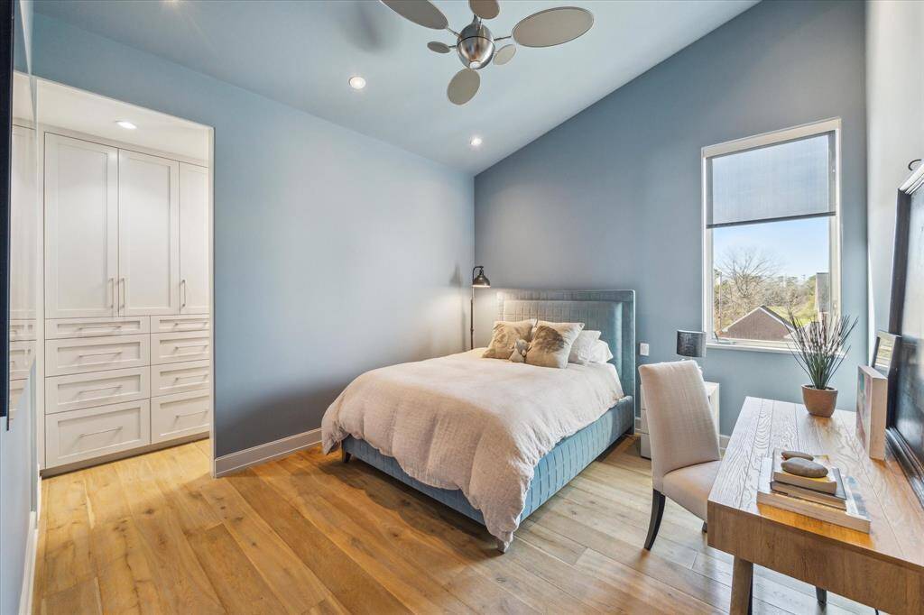 Upstairs bedroom with ensuite bath and a large closet, maximizing both space and functionality
