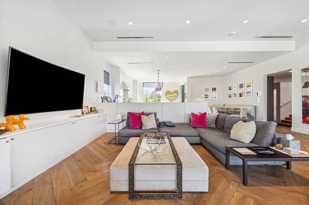 Imagine always being a part of the discussion while dinner is being prepared, keeping up with your favorite show or simply observing the natural stone fireplace warming the home on a chilly night in.