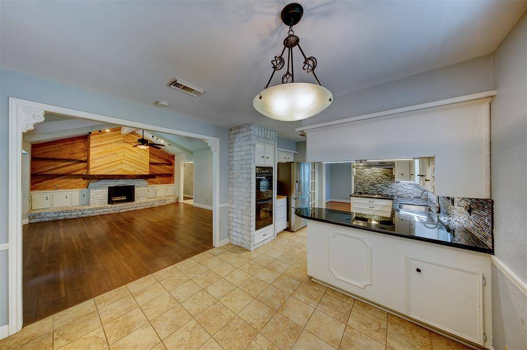 Breakfast area open to the kitchen and the living room