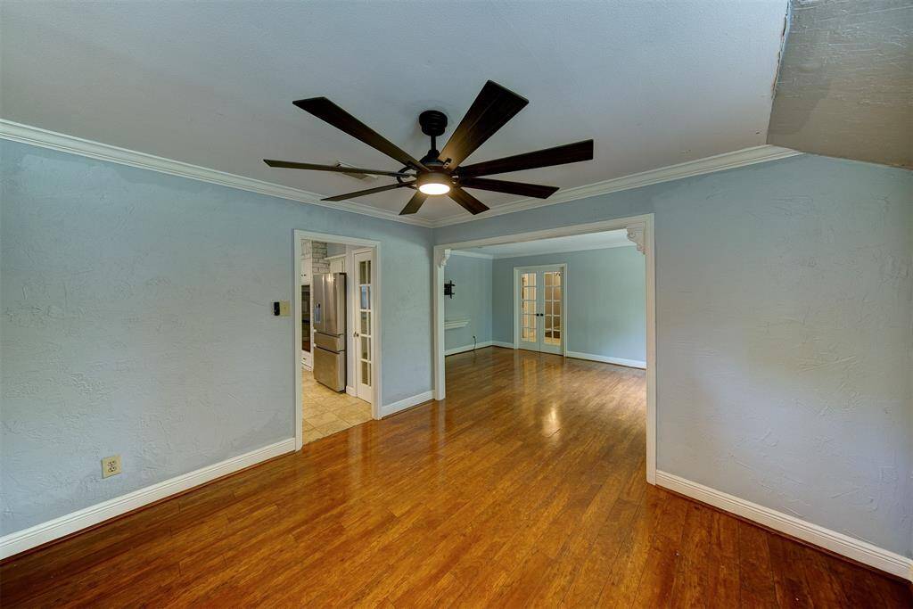 Formal dining room open to the kitchen and the formal living room/office/flex room