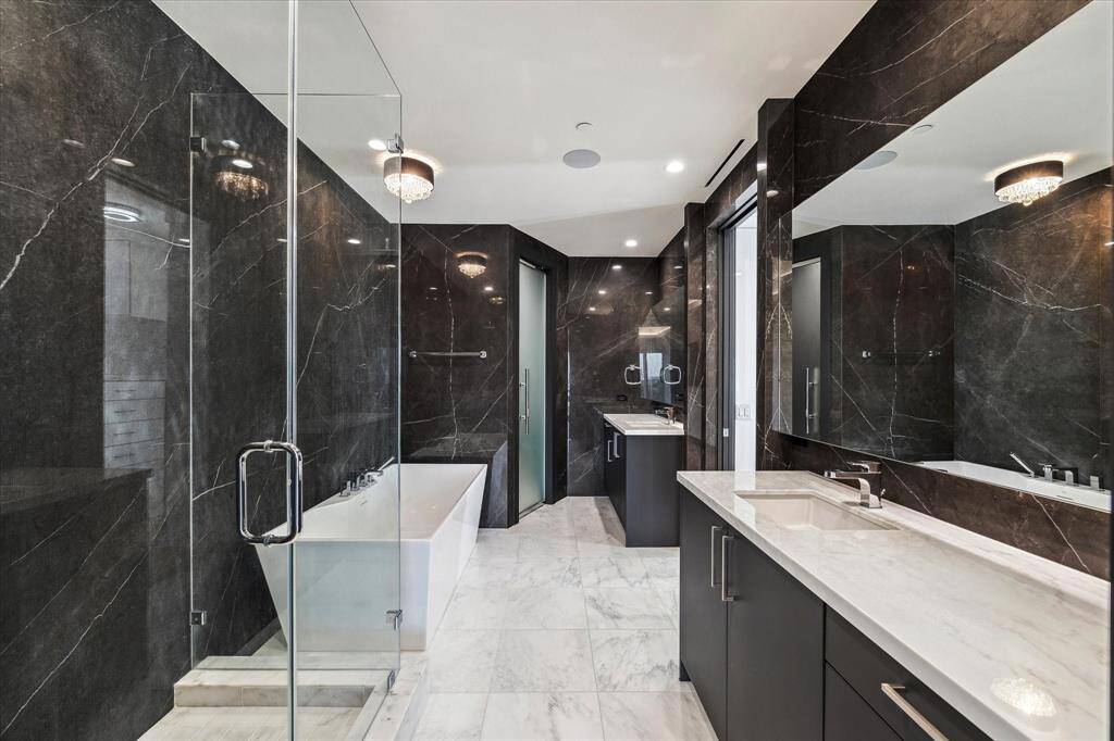 A spacious ensuite bathroom ensures you're prepared for anything the day brings.