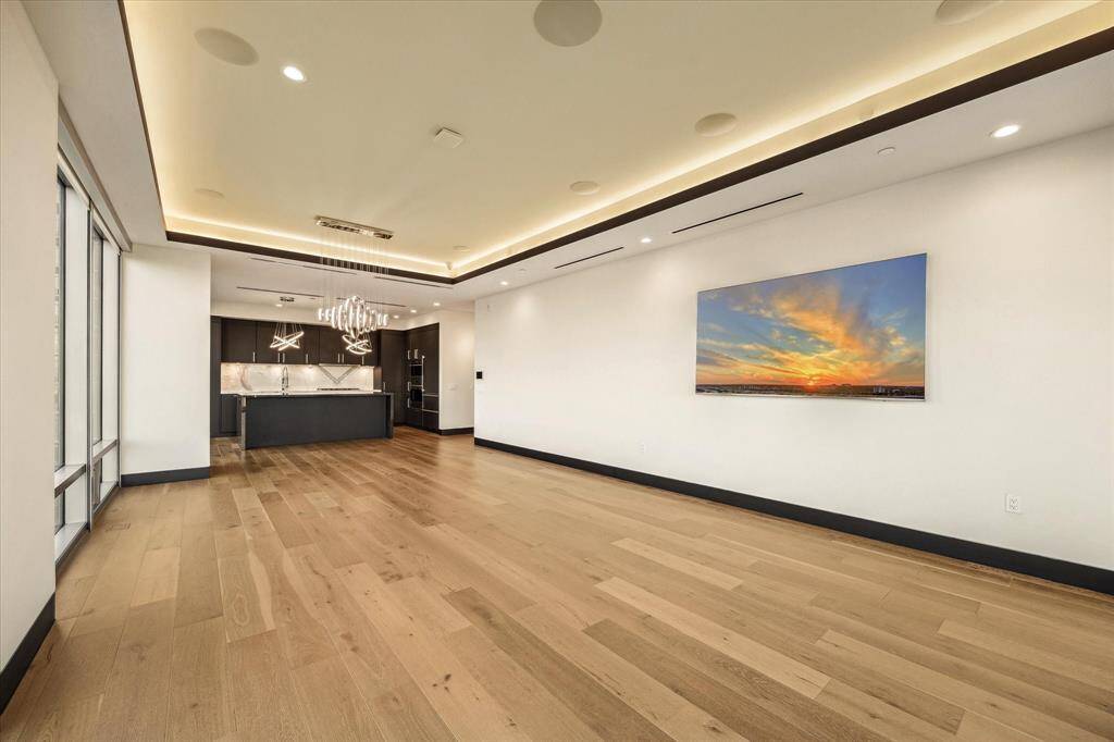 The living room does come equipped with an 82" Flat Screen for all of  your movie binging needs!