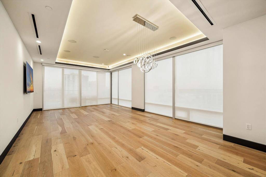 This home is equipped with a sophisticated Control4 system, allowing seamless control of electric shades and lighting for effortless ambiance and convenience.