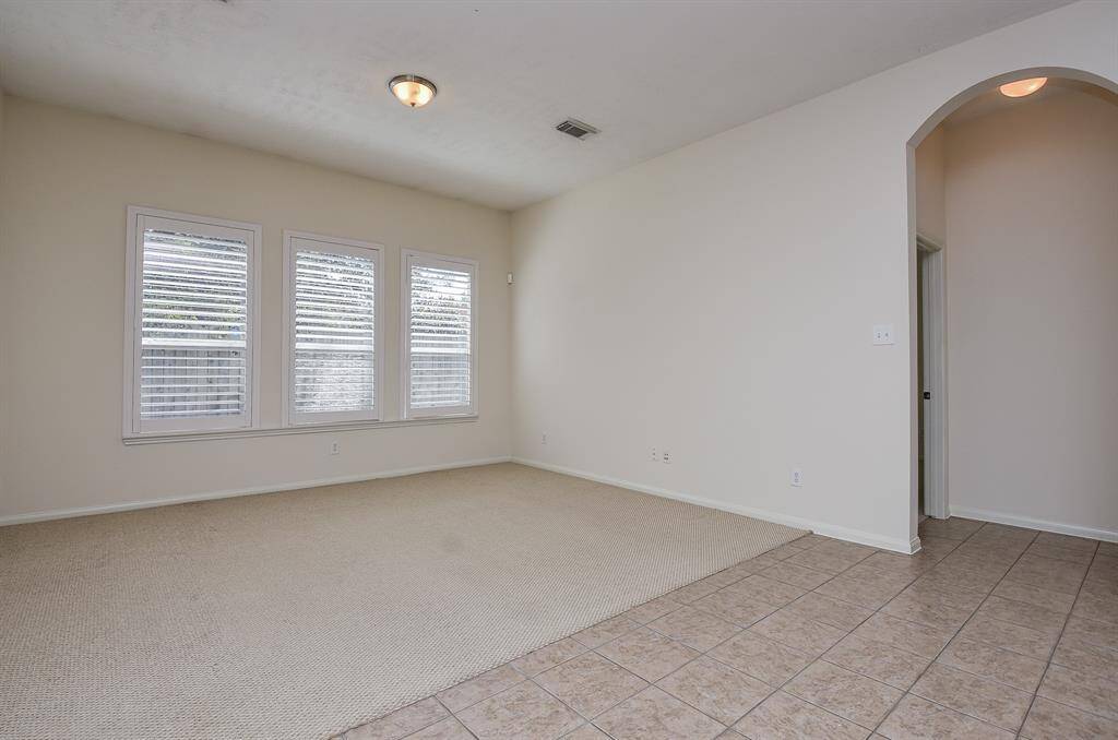 Family room W/ plantation shutters