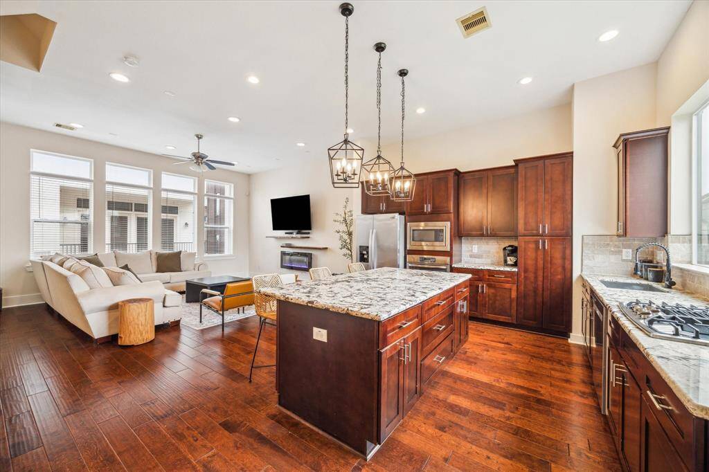 Open sight-lines from the Dining Room to the Living Room and Kitchen make this the perfect open-concept floor plan!